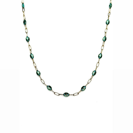 A shower-safe, gold-filled staple chain necklace with iridescent emerald green enamel beads.