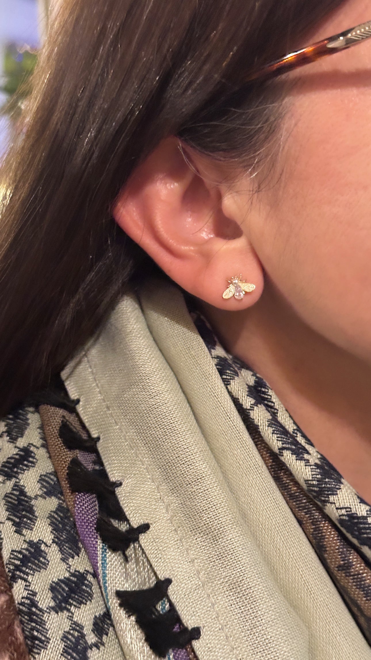 firefly earrings on ear