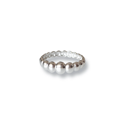Silver beaded ring on a white background