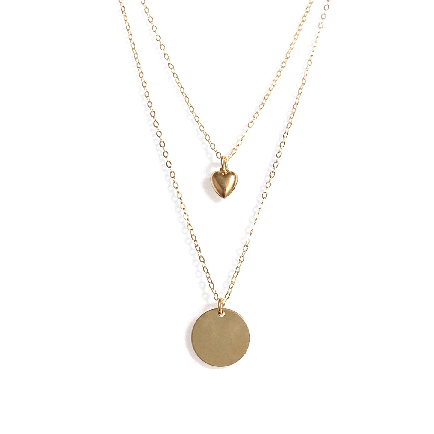 gold filled disc necklace layered with petite puffy hear necklace