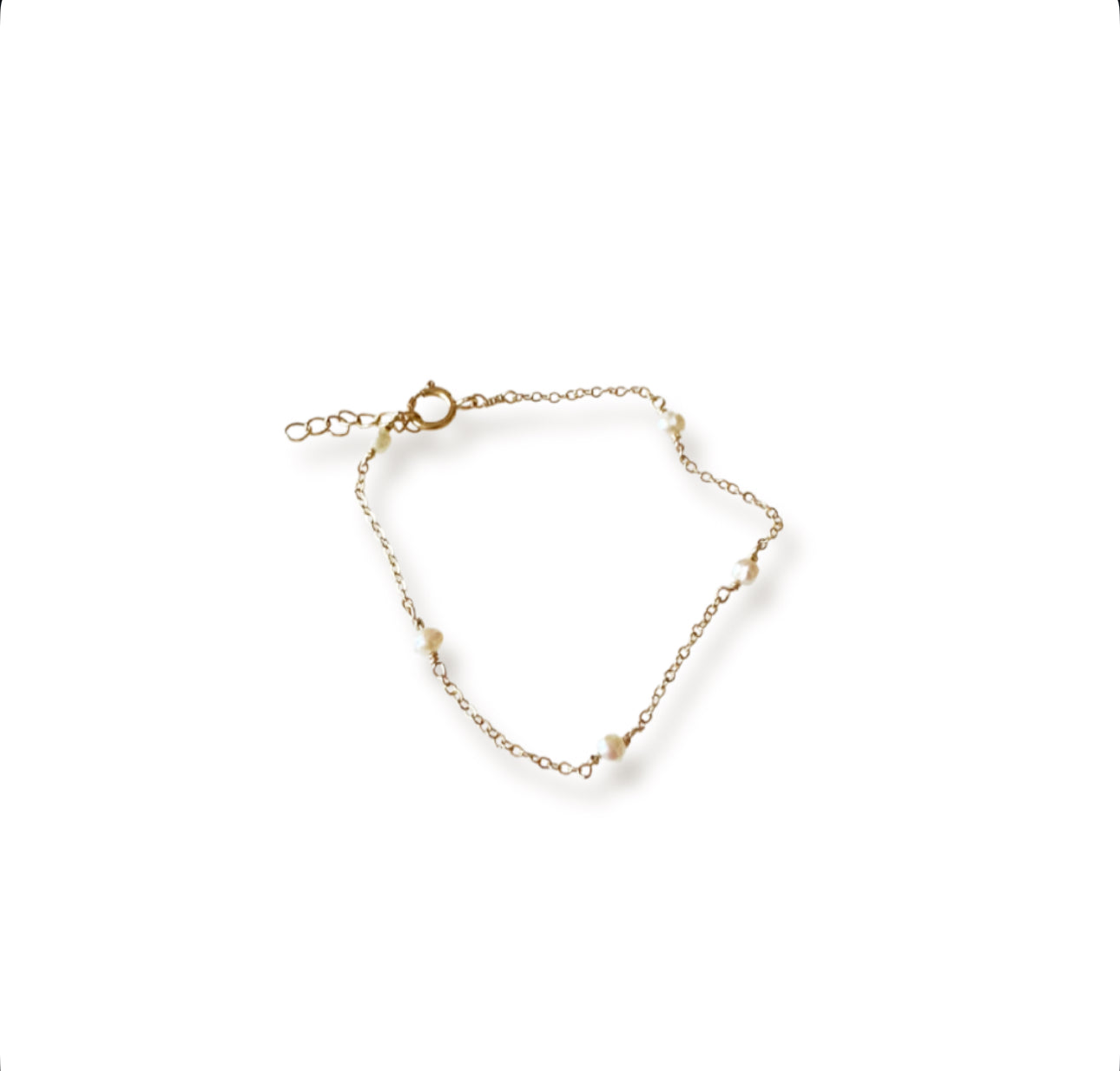 Gold bracelet on a white background