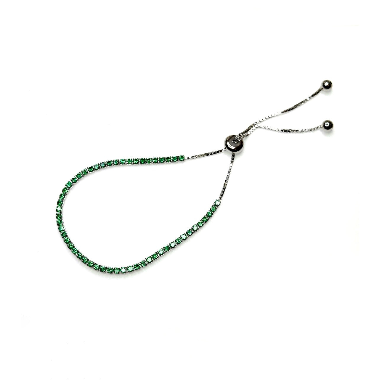 A green cubic zirconia bolo tennis bracelet with sterling silver accents on a white background.