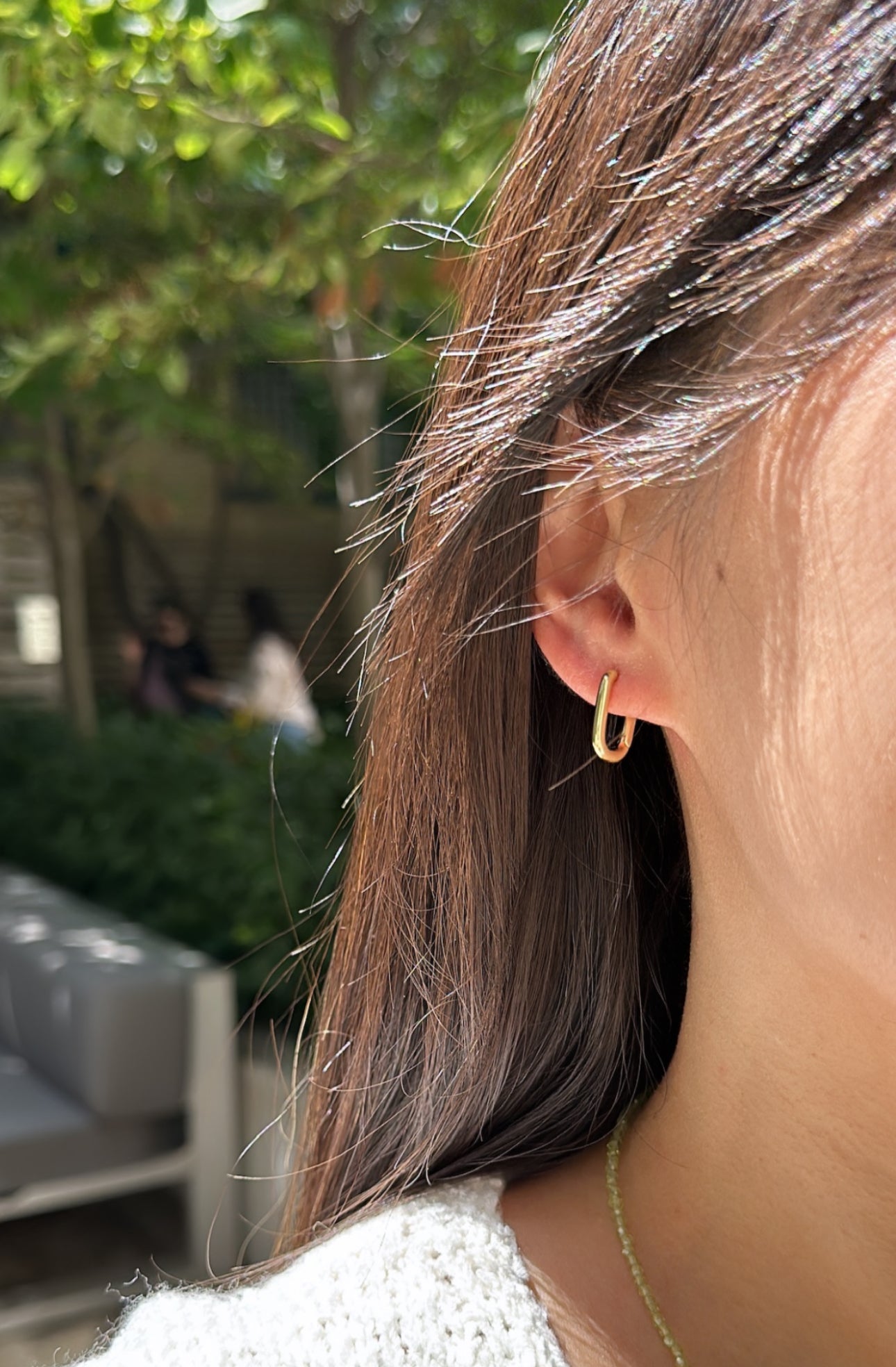 Petite rectangular hoop earrings styled on model, 12x15mm sterling silver hoops