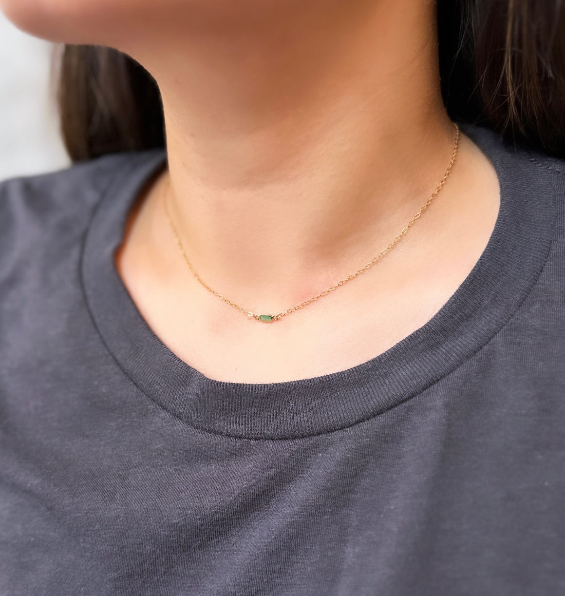 Teeny evil eye necklace with solid gold pendant on 14K gold-filled chain