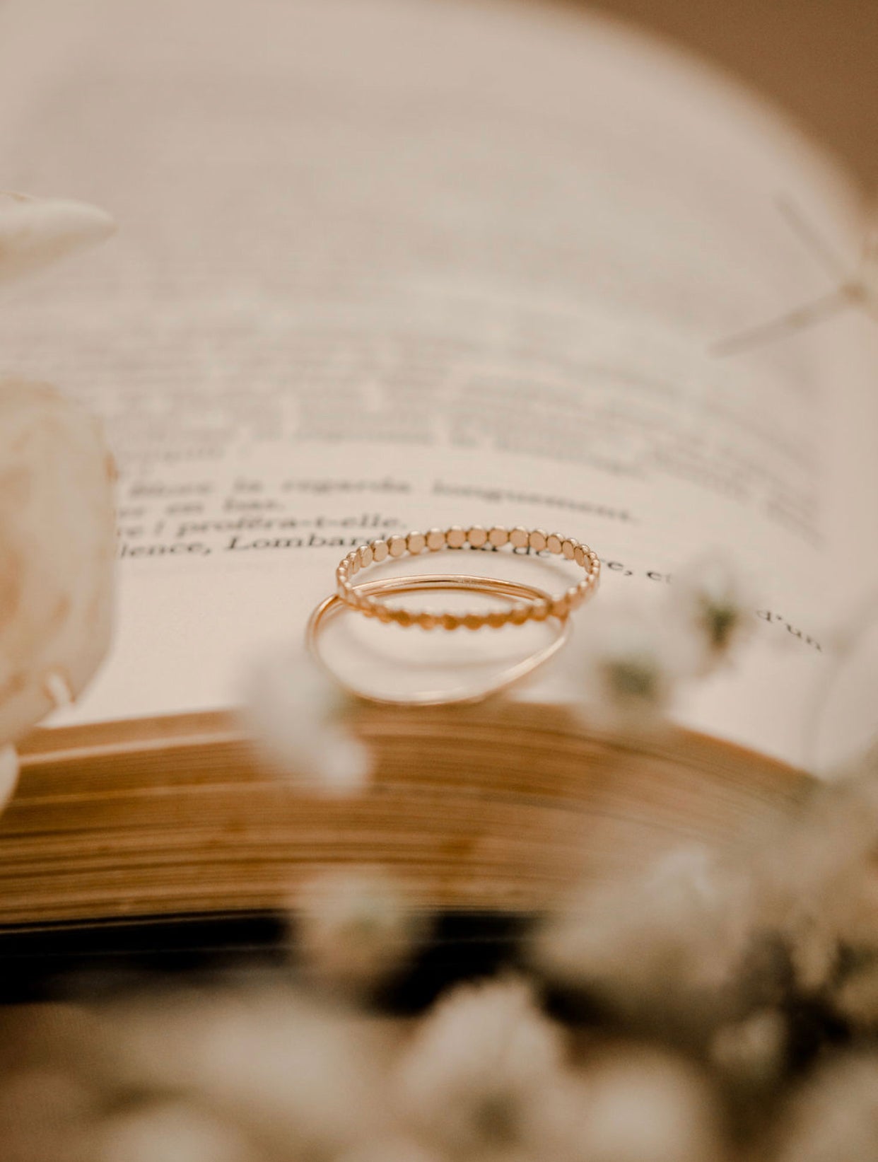 Close-up detail of 10K solid gold coin eternity ring showing coin pattern