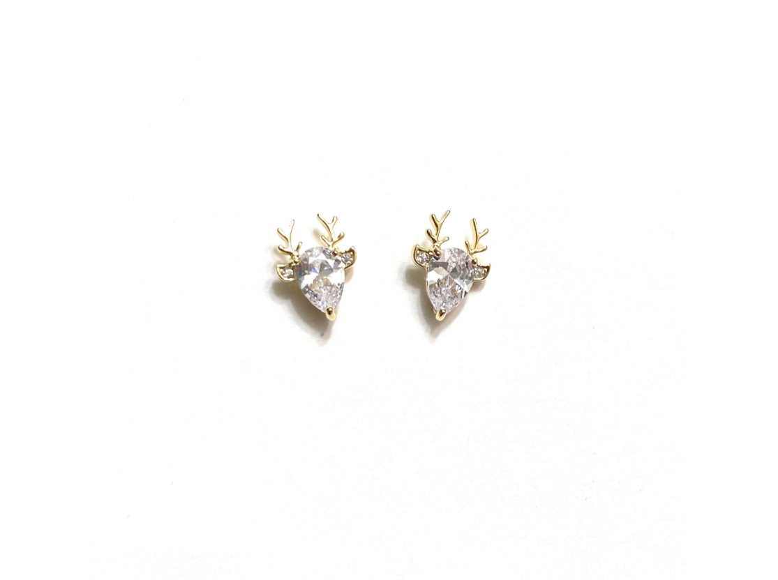 Close up of holiday reindeer stud earrings showing sparkly antler detail - festive Christmas earrings
