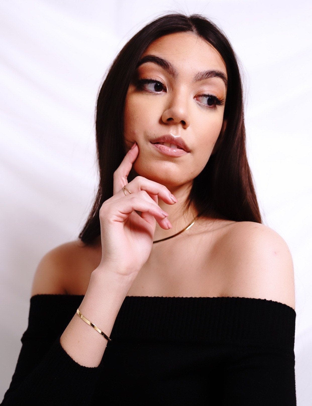 Gold herringbone chain necklaces layered together showing 16" and 20" lengths for statement look