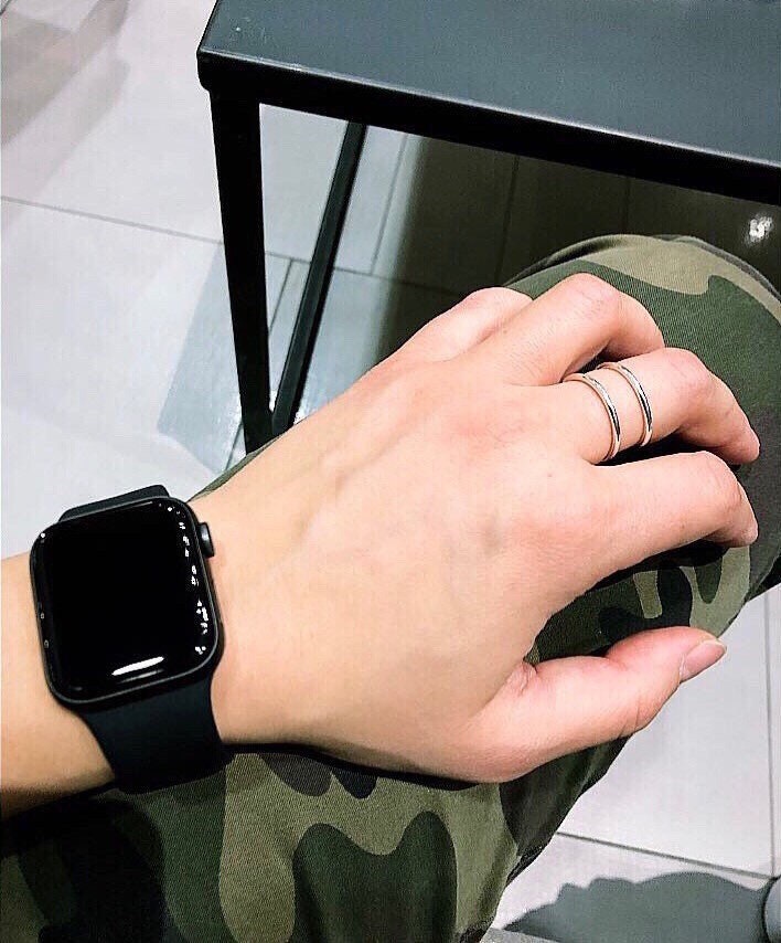 Side profile of parallel ring showing sleek sterling silver design and comfortable fit