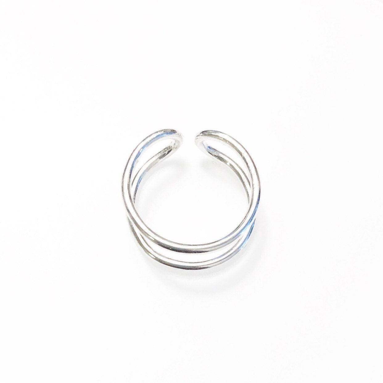Close-up detail of parallel ring showing 925 sterling silver quality and minimalist design
