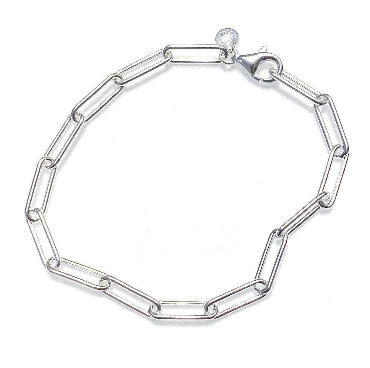 A sterling silver chunky paperclip chain bracelet showcasing the interlinked chain design with a lobster clasp closure.
