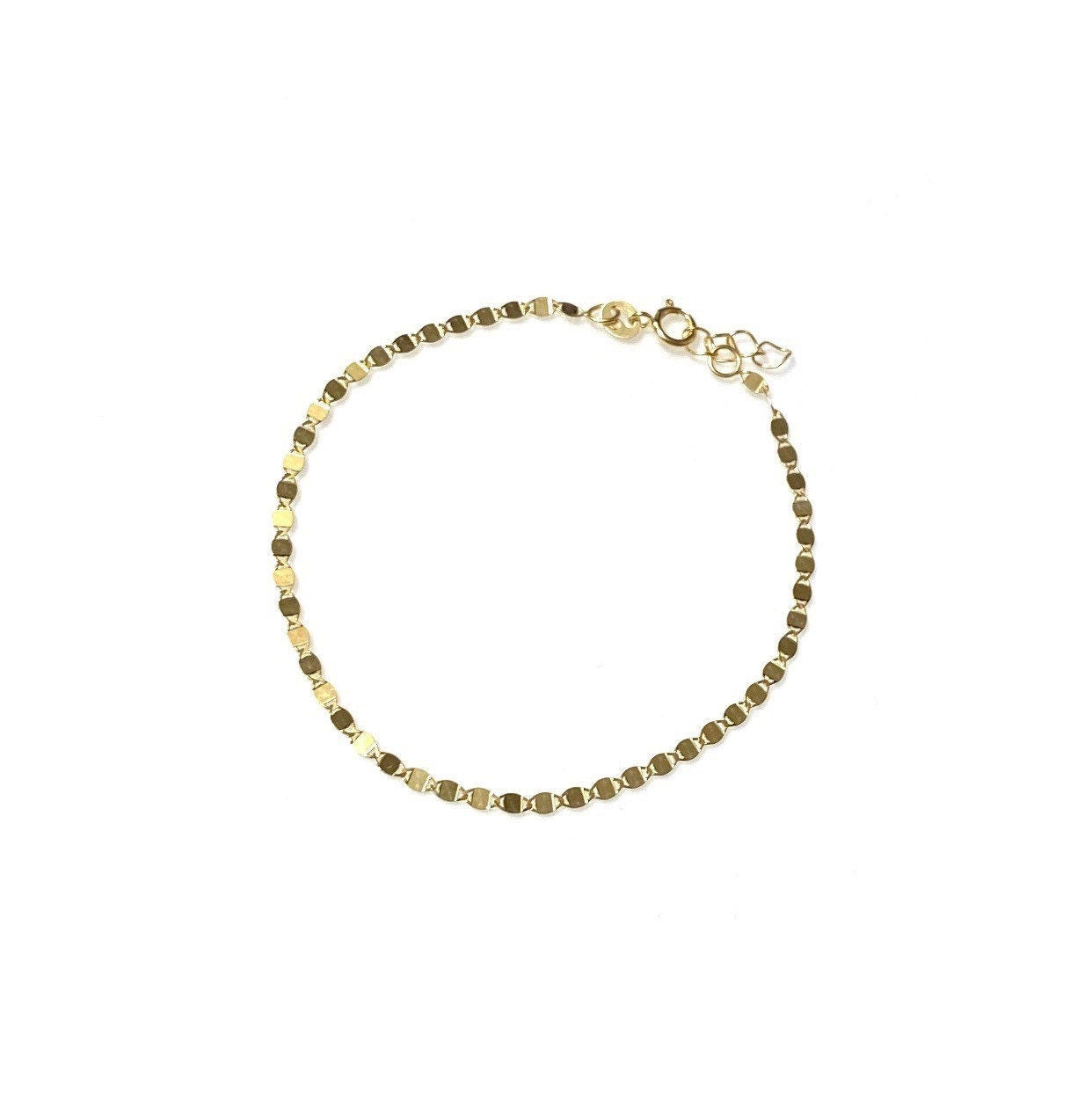 dainty valentino chain bracelet on white background