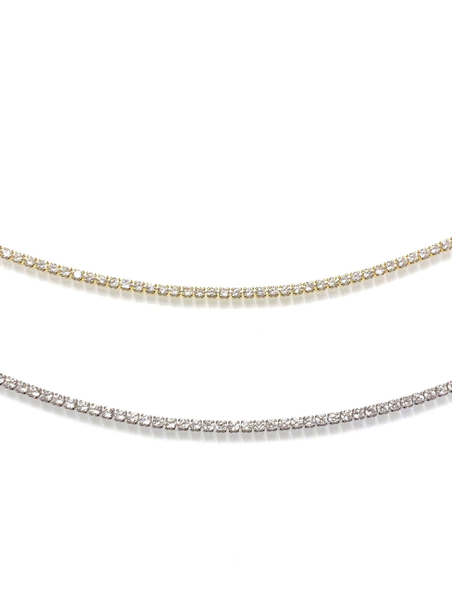 gold and silver dainty tennis necklace layered