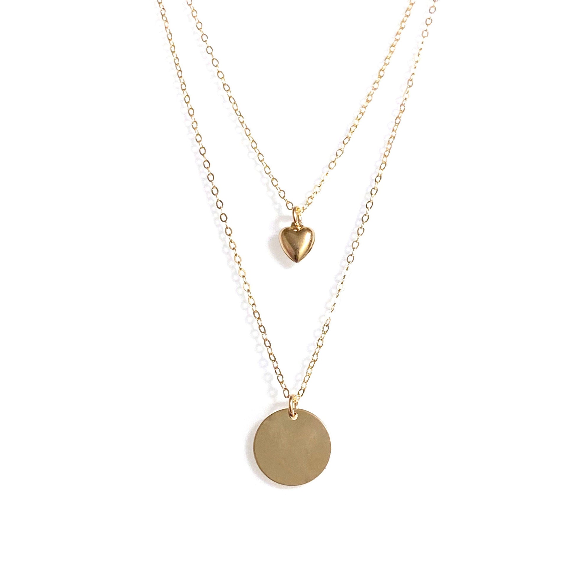 gold filled disc necklace layered with petite puffy hear necklace
