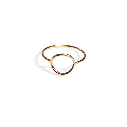 A simple gold-filled minimalist circle ring displayed against a white background.
